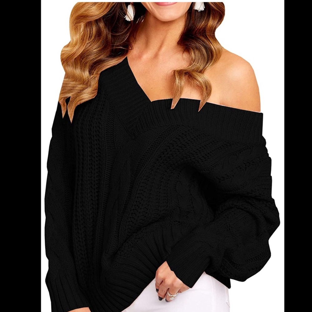 Black off the shoulder baggy sweater.